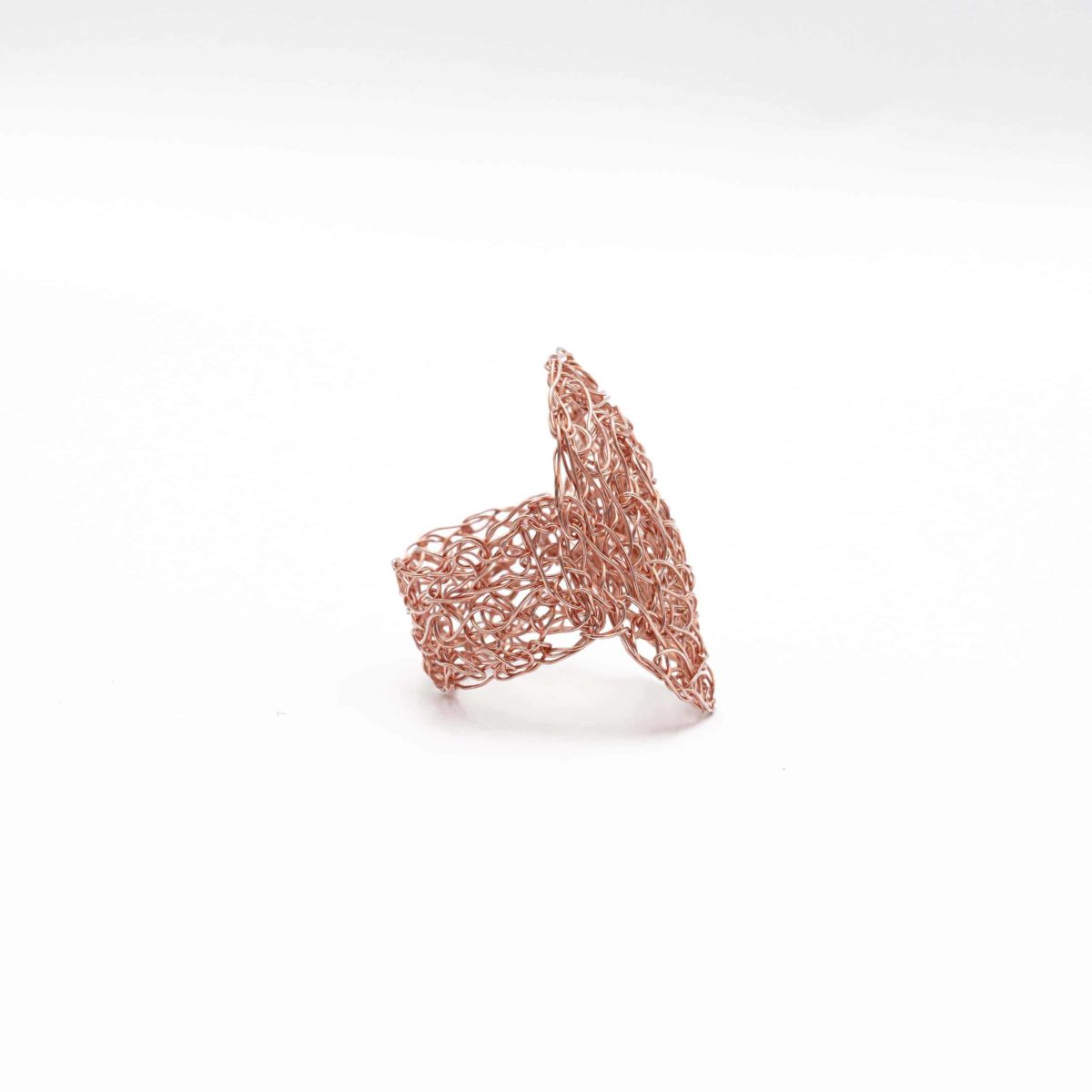 side view of adjustable ring in rose gold