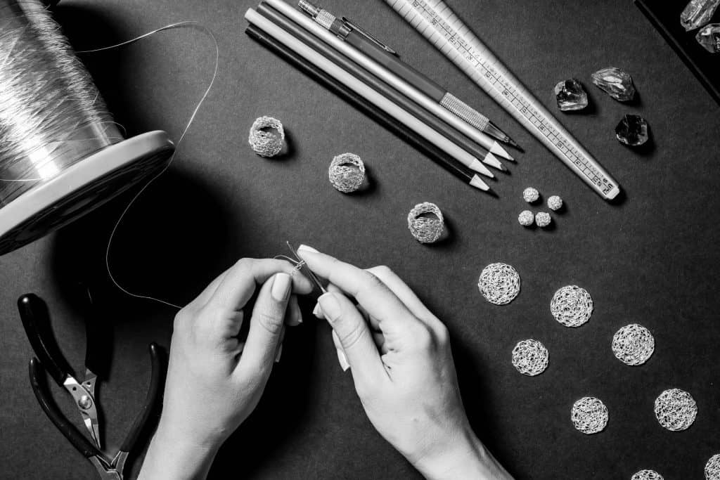 Maria Glezelli making ethical jewelry from her workshop