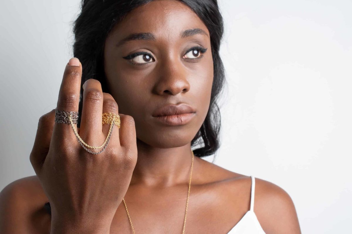 model wearing slave ring in gold