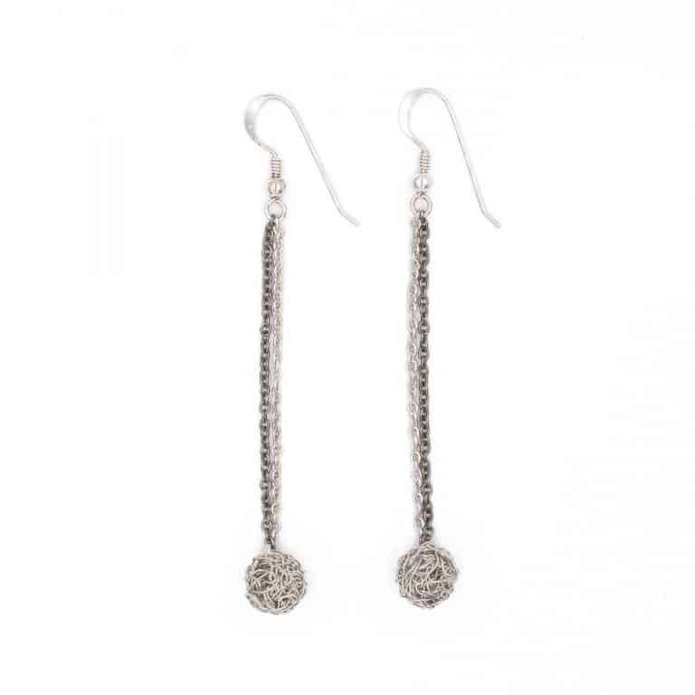 long silver earrings with a small handmade sphere